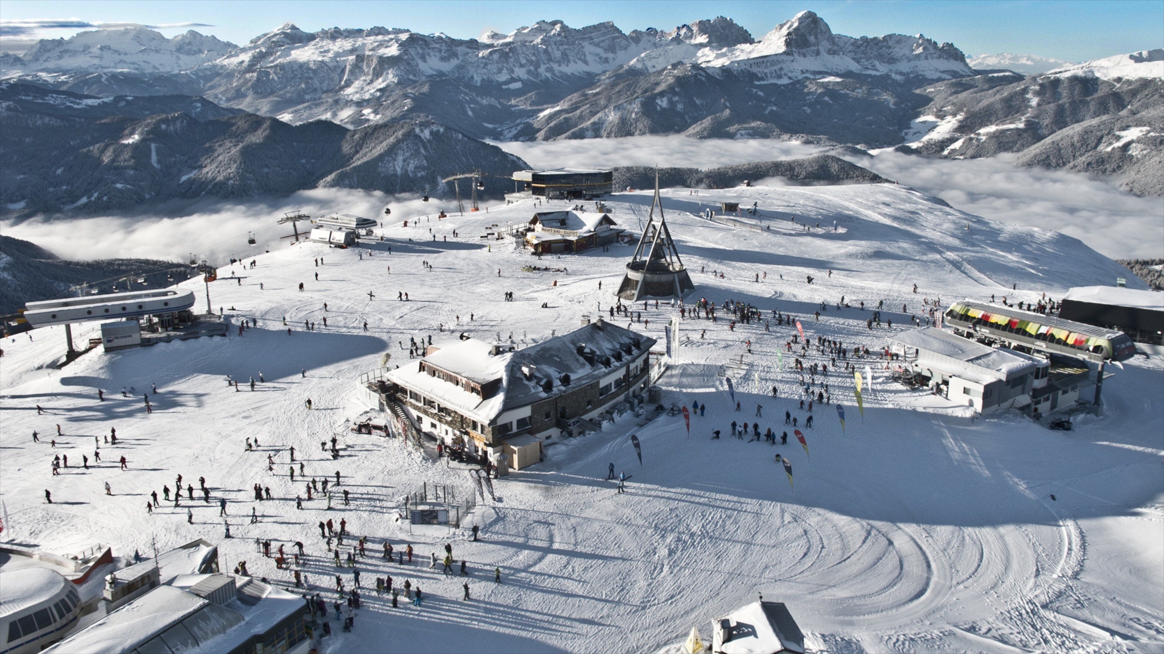 Kronplatz Holiday Region featuring mountains, a luxury hotel or resort and snow