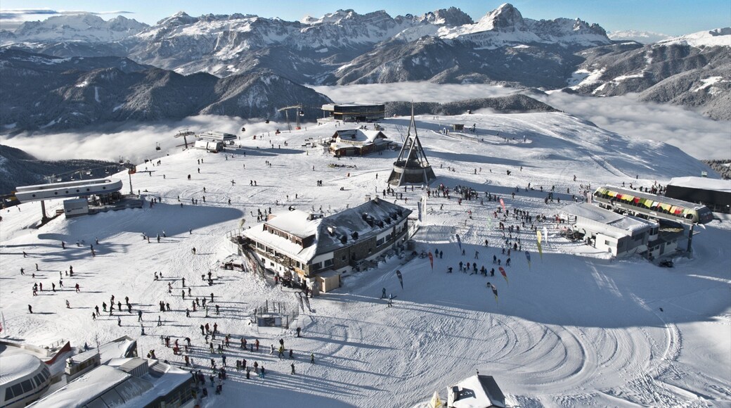 Kronplatz Holiday Region featuring mountains, a luxury hotel or resort and snow