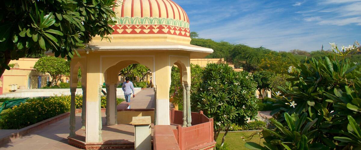 Sisodia Rani Palace and Garden featuring a garden and a castle