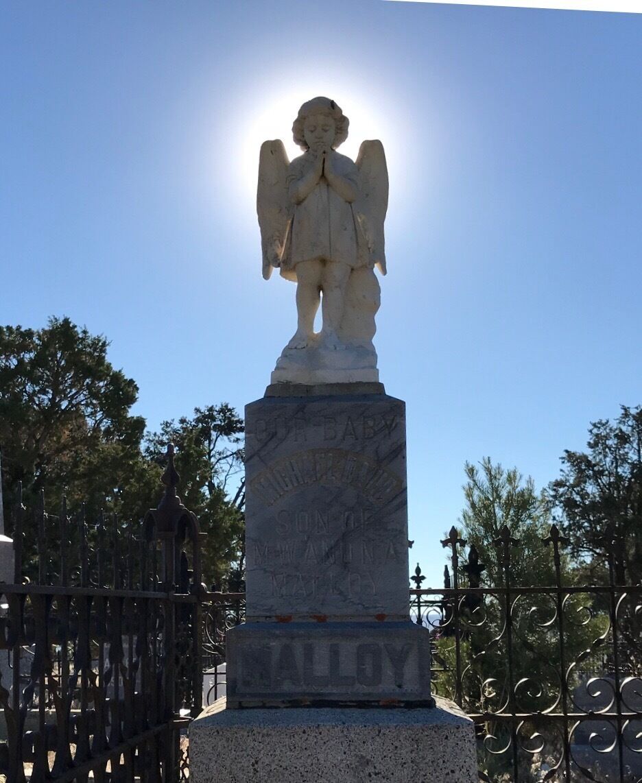 Old cemetery with buried miners and their families, immigrants from all over. 