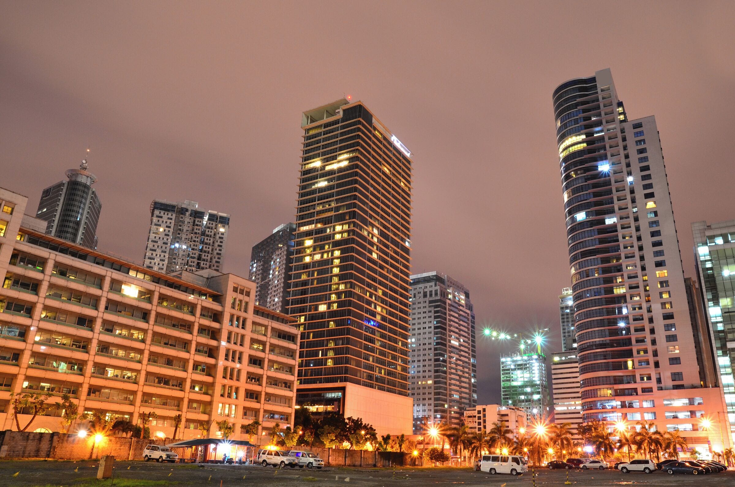 500px Photo ID: 80197039 - Worm's eye view of Oakwood Premier-Joy Nostalg Center and the Malayan Plaza