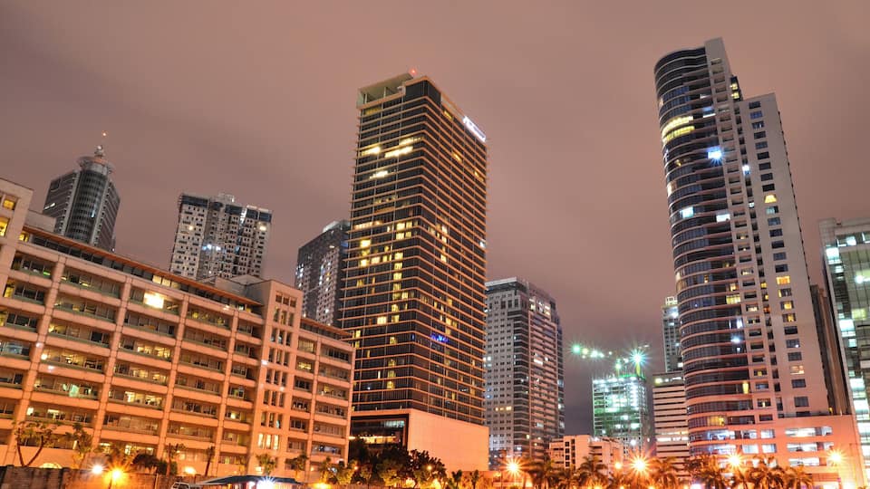 500px Photo ID: 80197039 - Worm's eye view of Oakwood Premier-Joy Nostalg Center and the Malayan Plaza