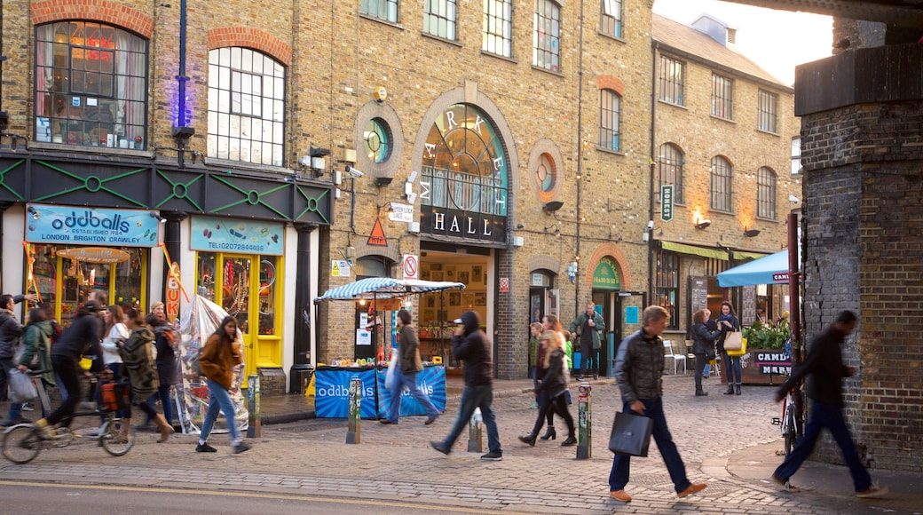 Camden Markets showing street scenes as well as a small group of people