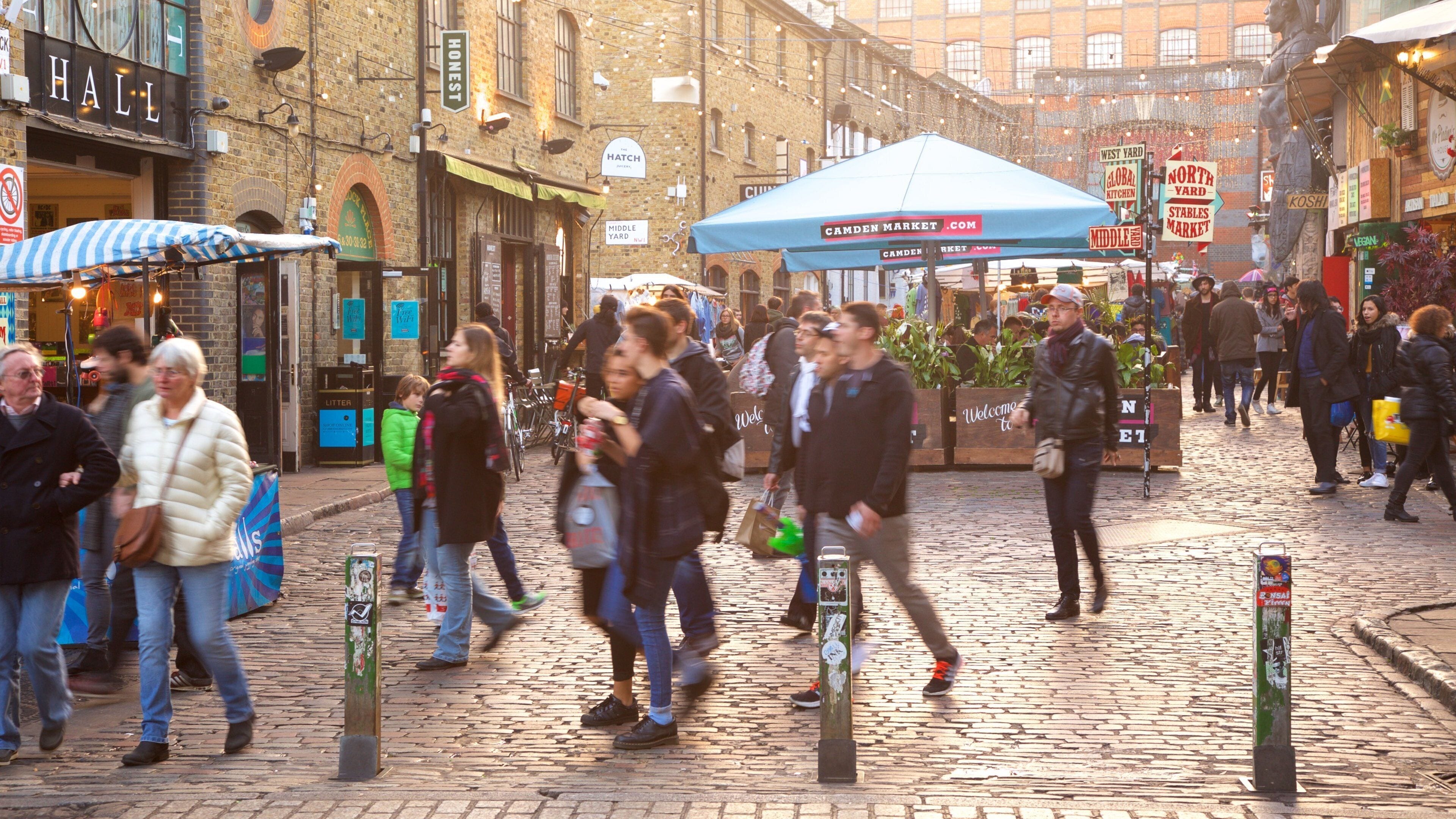 Camden Markets which includes markets and heritage architecture as well as a small group of people