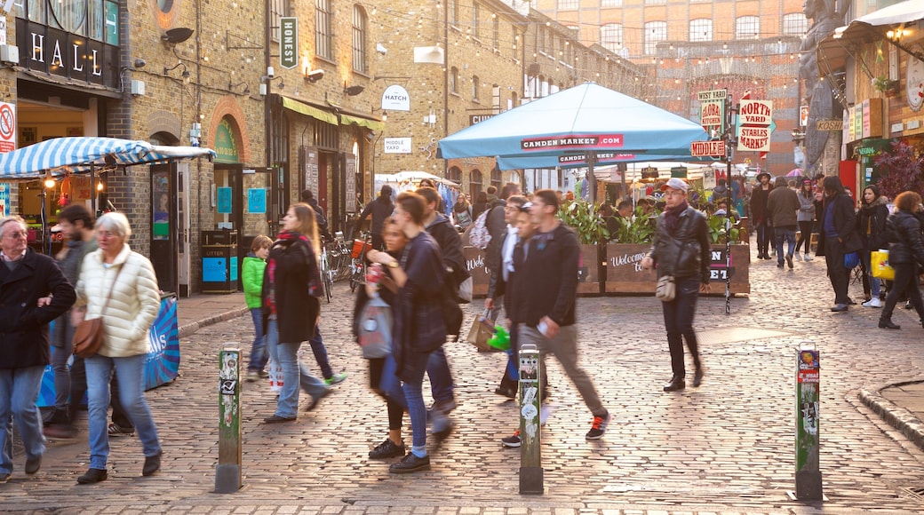 Camden Markets which includes markets and heritage architecture as well as a small group of people