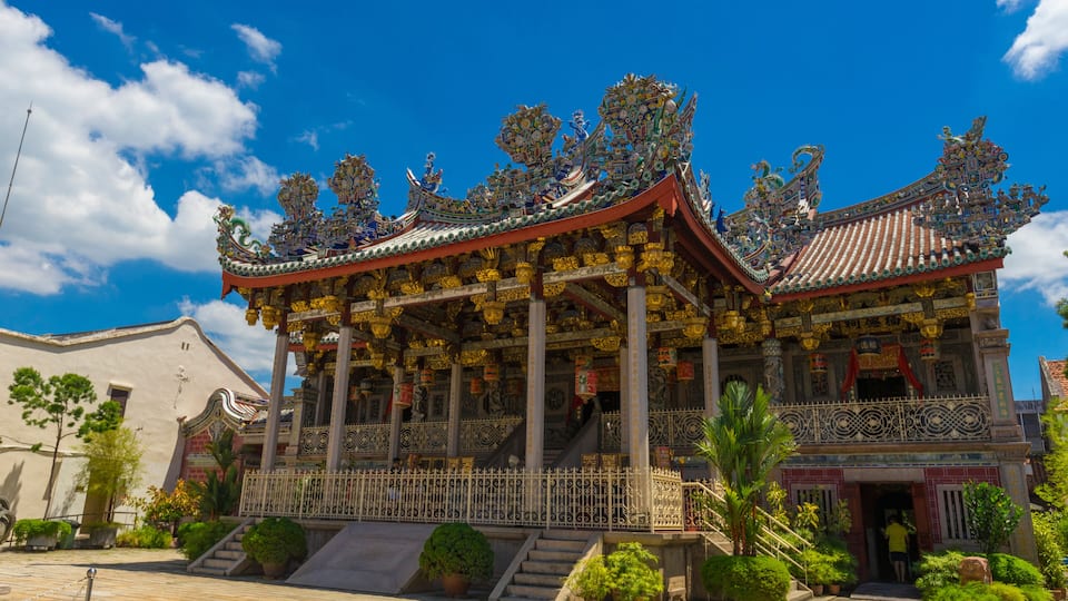 Exterior view of Leong San Tong Khoo Kongsi clanhouse against blue sky in Penang, Malaysia
