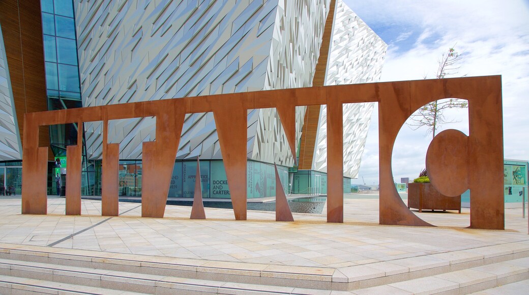 Titanic Belfast featuring signage and modern architecture