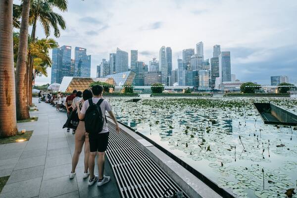 ArtScience Museum which includes a pond and a city as well as a couple