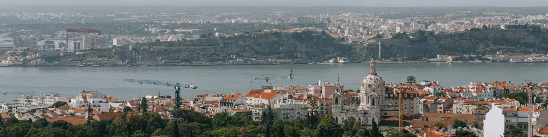 Amoreiras Shopping Center which includes landscape views, a river or creek and a city