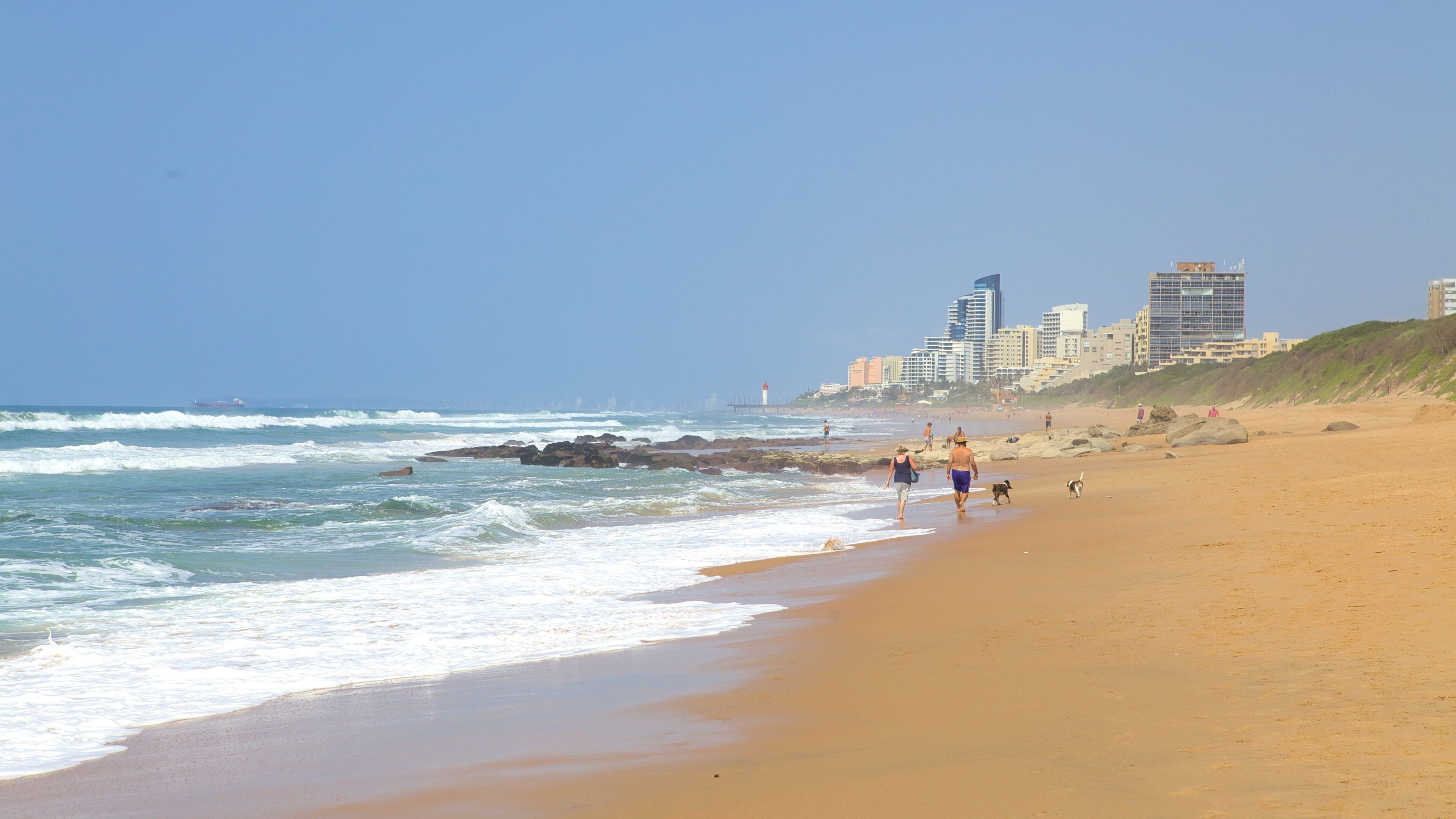 Umhlanga Lagoon Nature Trail which includes landscape views, a coastal town and a beach