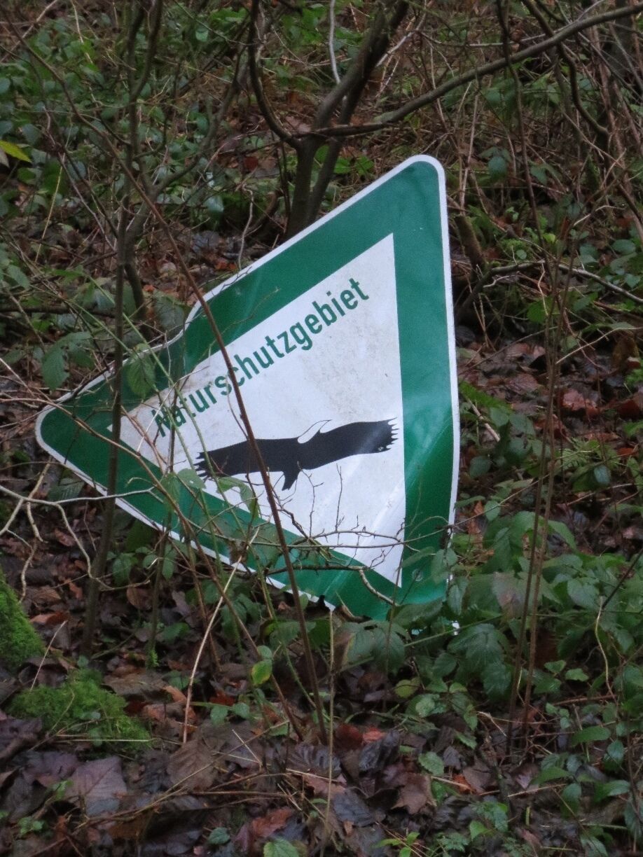 Sign on the ground.

Picture taken during my trip to Germany last month.

This was on the ground, alongside a nature trail, in a small village called Marialinden.  