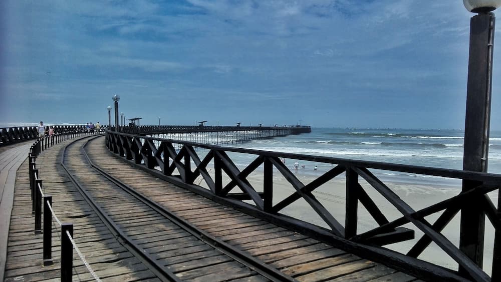 Pimentel port in Chiclayo City. You can see the rails byte where the train passed to the end of the port. #blue