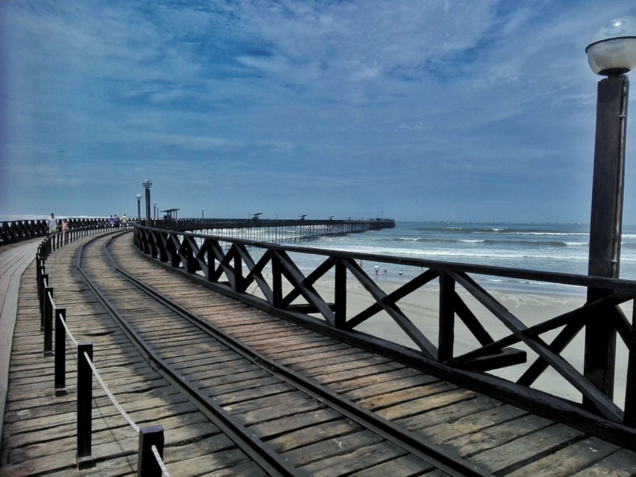 Pimentel port in Chiclayo City. You can see the rails byte where the train passed to the end of the port. #blue