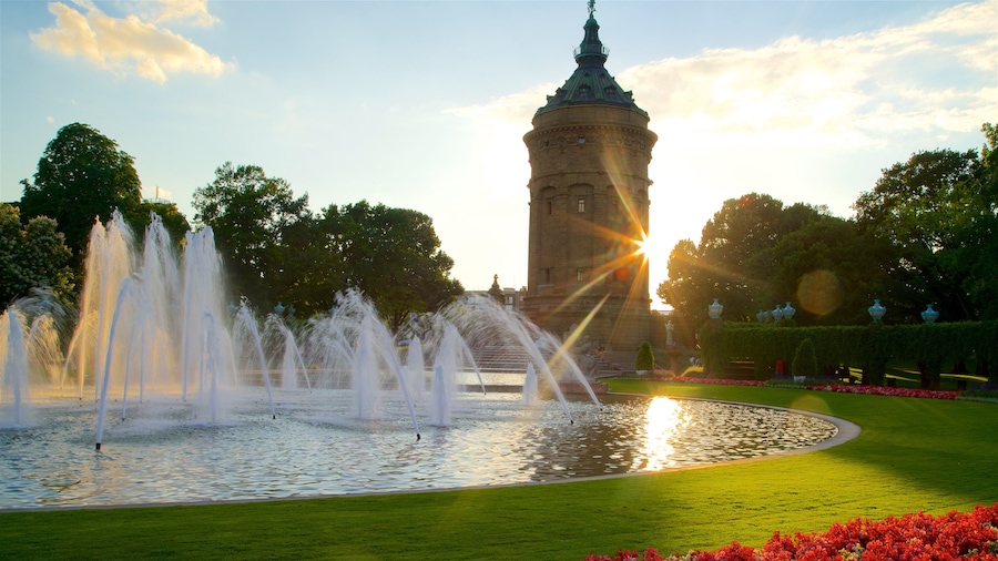 Mannheim Water Tower which includes heritage architecture, flowers and a park