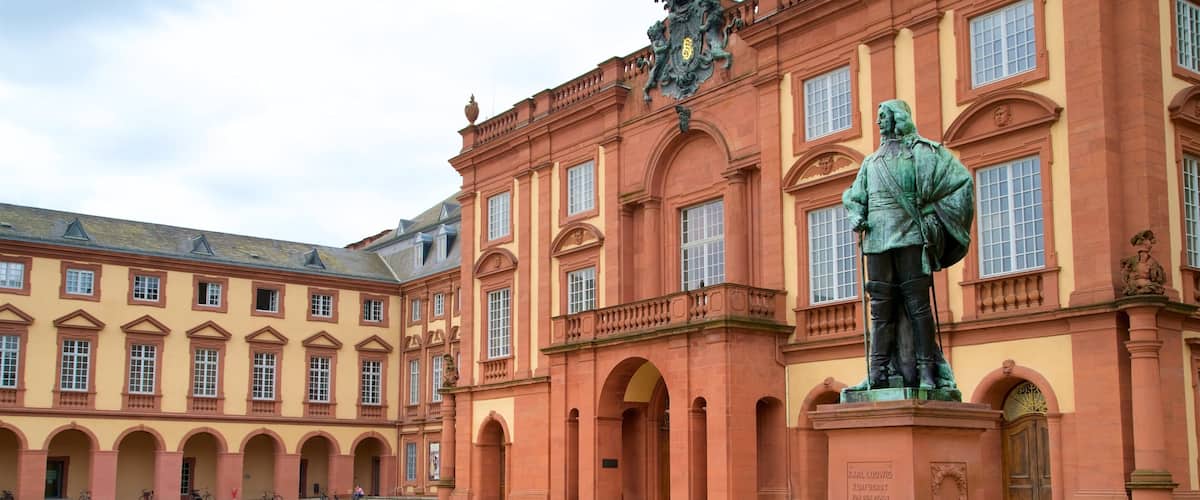 Mannheim Palace which includes a statue or sculpture, a square or plaza and heritage elements
