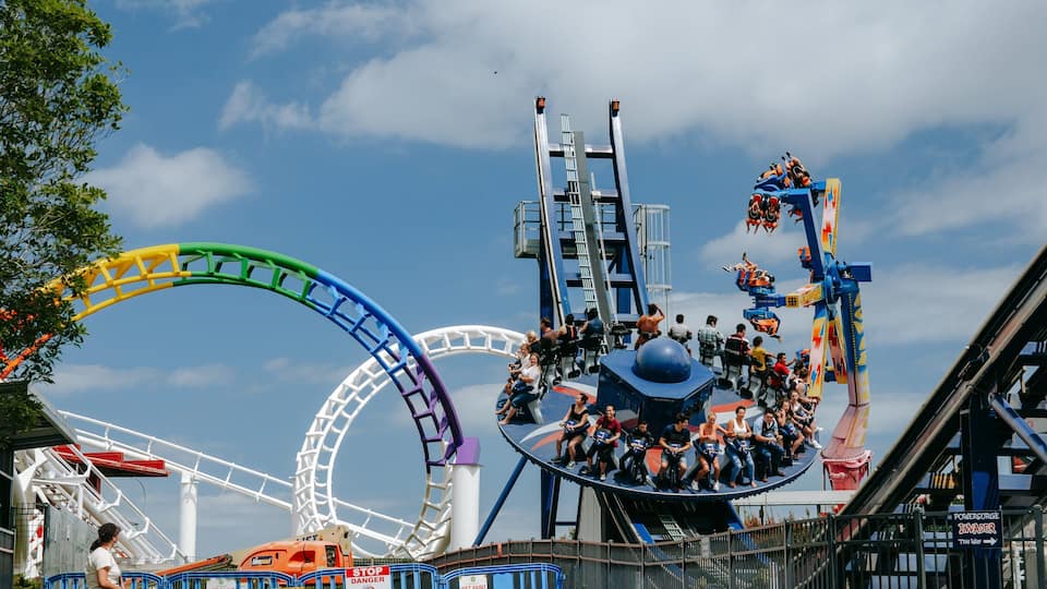Rainbow\'s End which includes rides as well as a small group of people