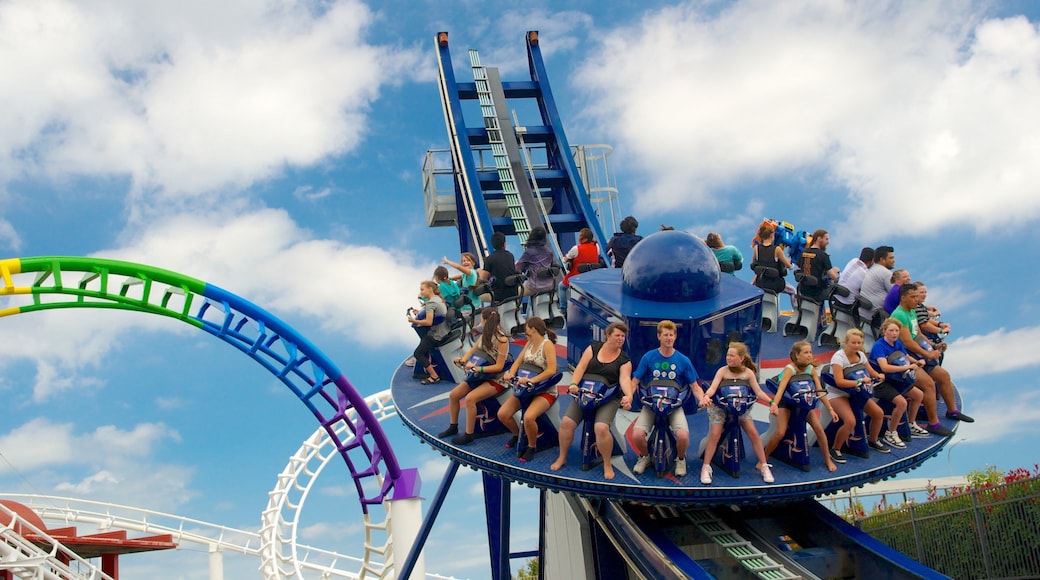 Rainbow\'s End showing rides as well as a large group of people