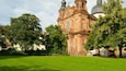 Mannheim Jesuit Church showing a church or cathedral, heritage architecture and a park