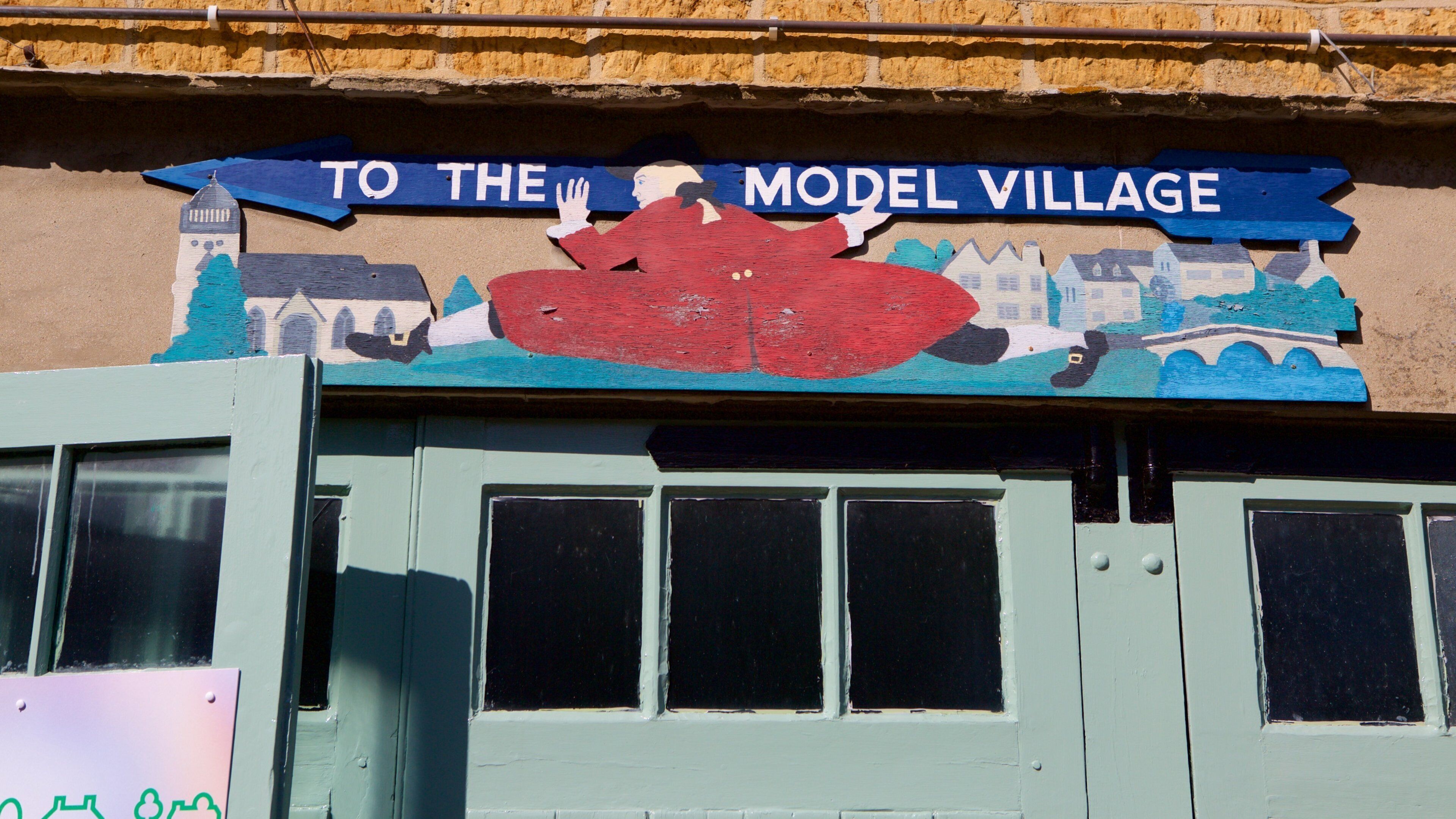 The Model Village som inkluderer skilt