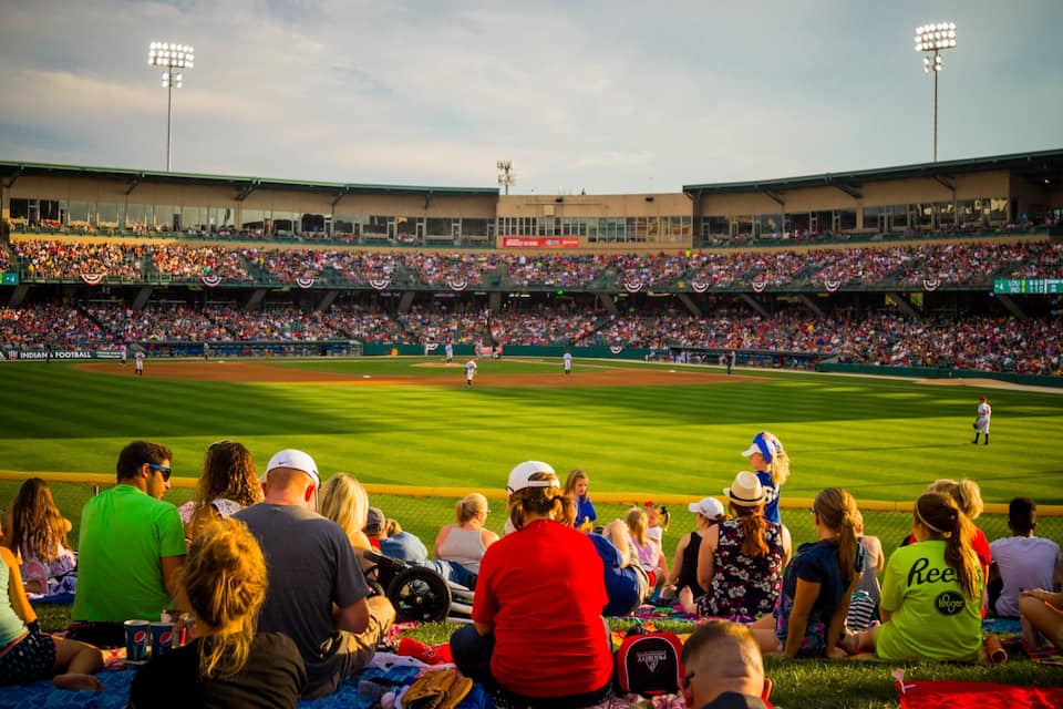 A baseball stadium filled with spectators.