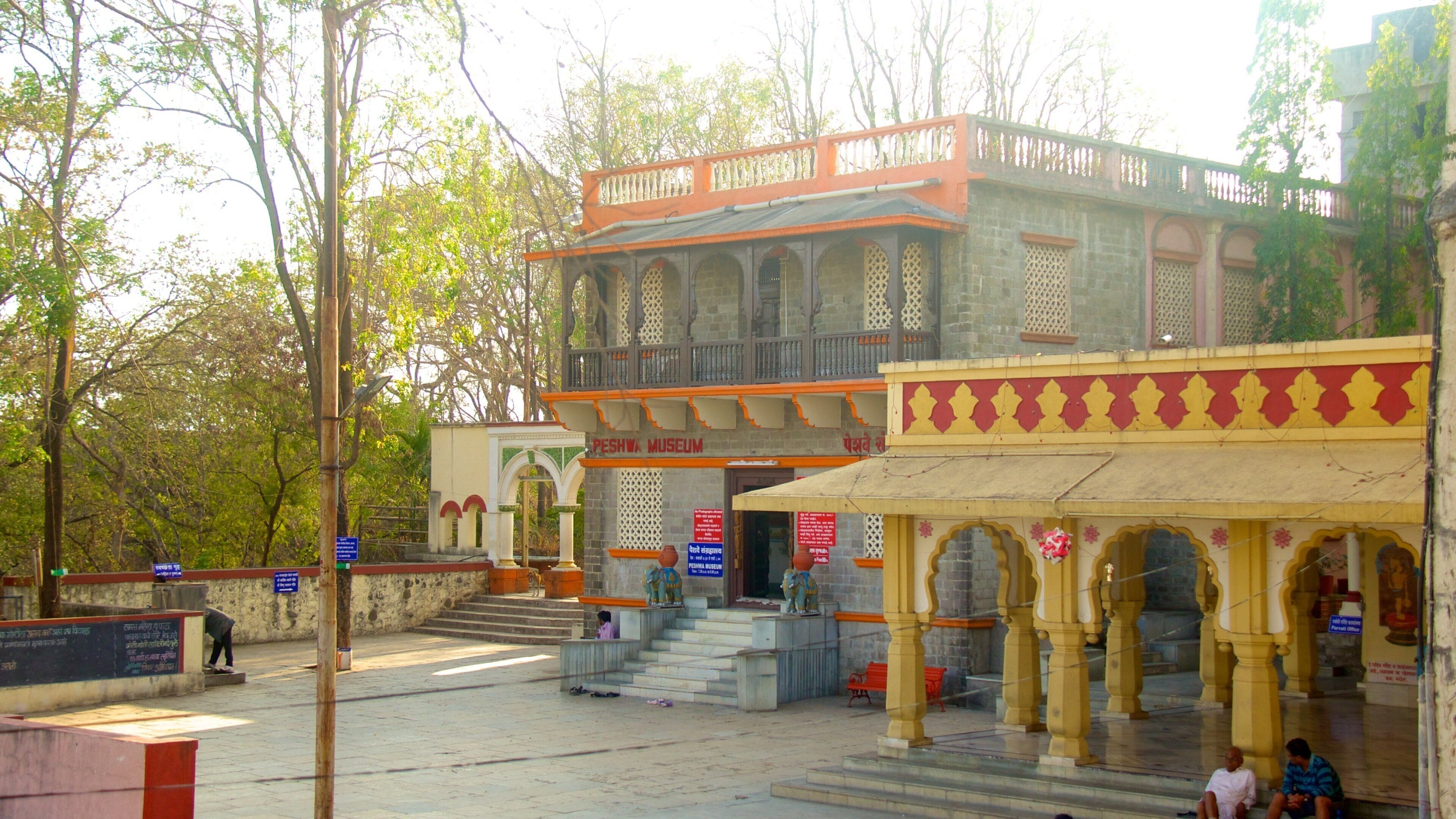 Parvati Temples featuring street scenes, heritage architecture and a temple or place of worship