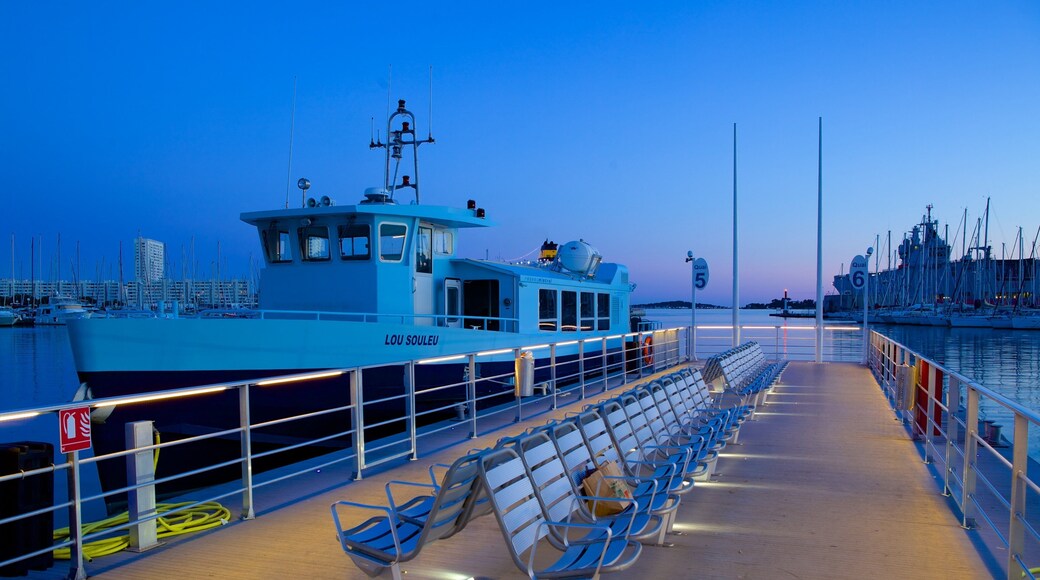 Port of Toulon which includes night scenes, boating and a marina