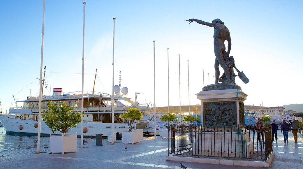 Toulon Marina which includes street scenes and a statue or sculpture