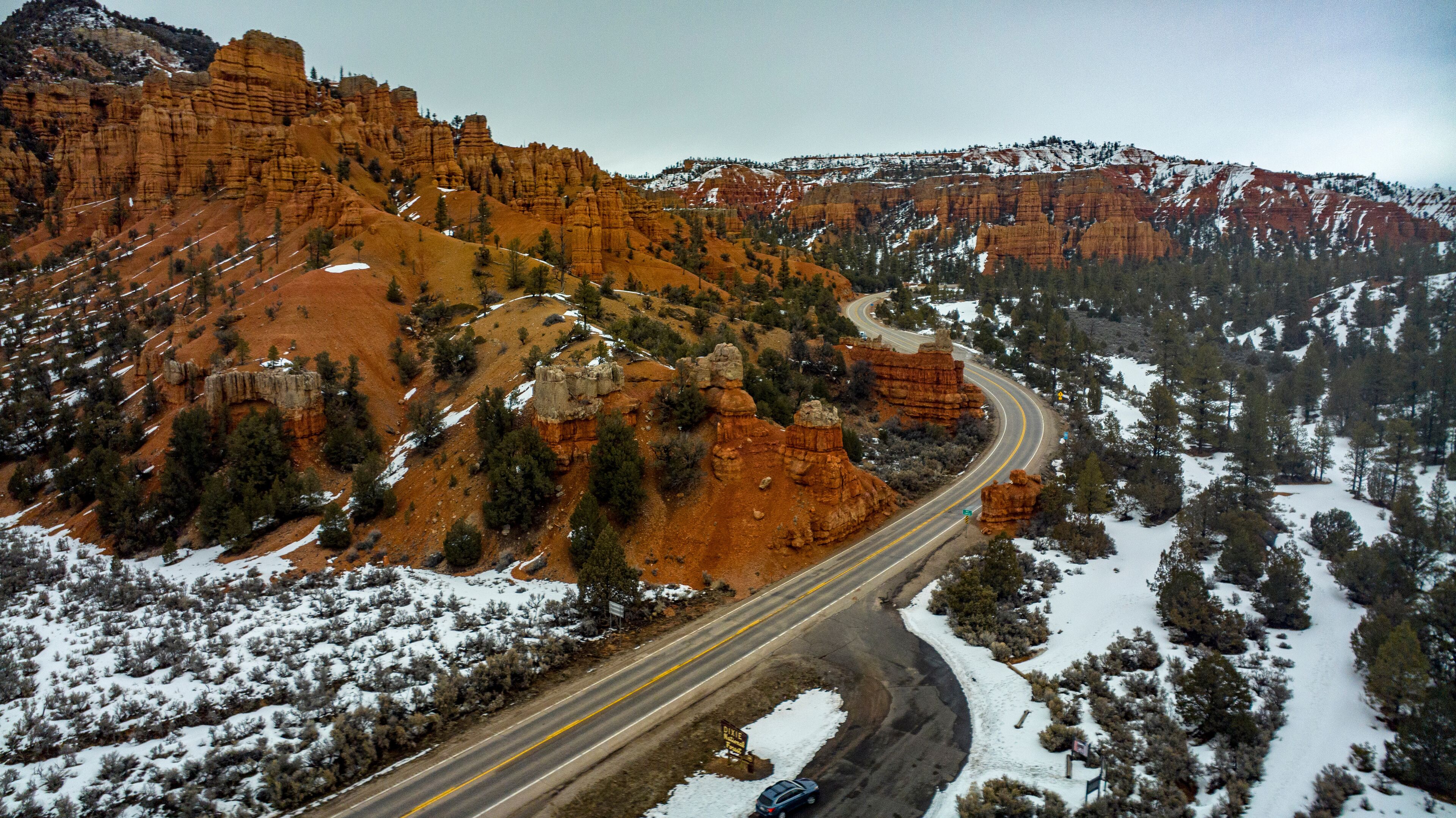 MARCH 11, HIGHWAY 12, RED CLIFF, UTAH - All American Scenic road Highway 12 through snowy mountains and red rock leading to Bryce National Park