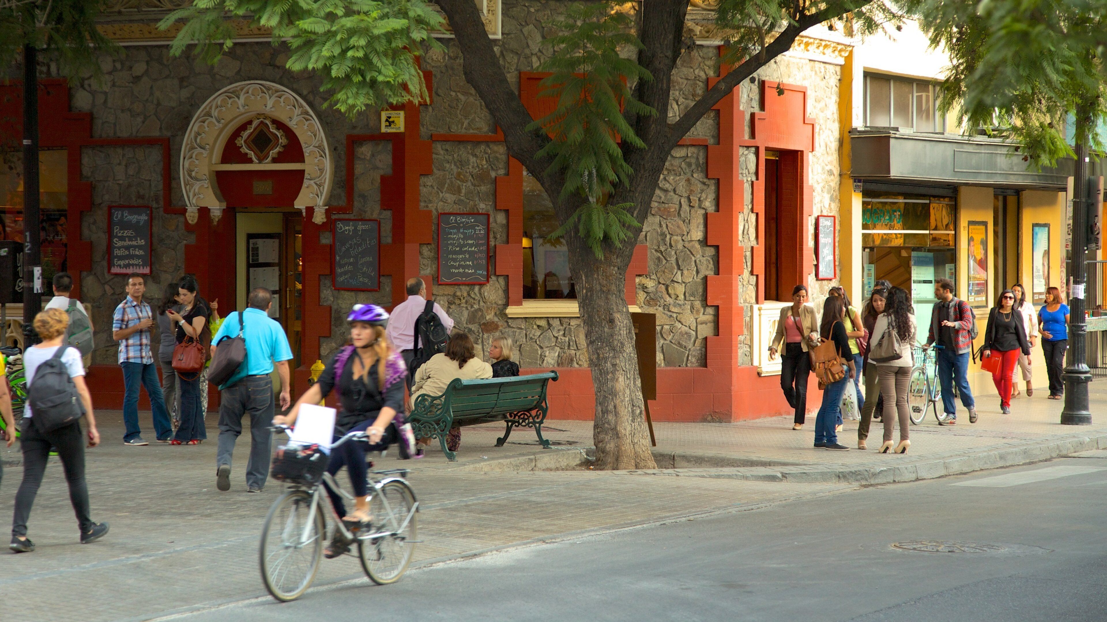 Lastarria featuring street scenes as well as a large group of people