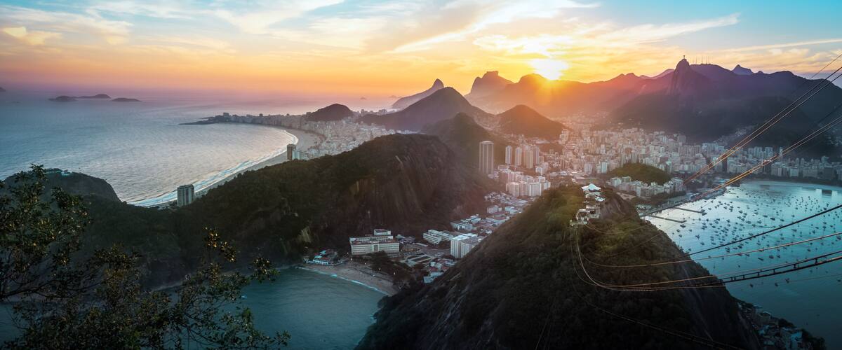 Aerial view of Rio de Janeiro Coast with Copacabana, Praia Vermelha beach, Urca and Corcovado mountain at sunset - Rio de Janeiro, Brazil