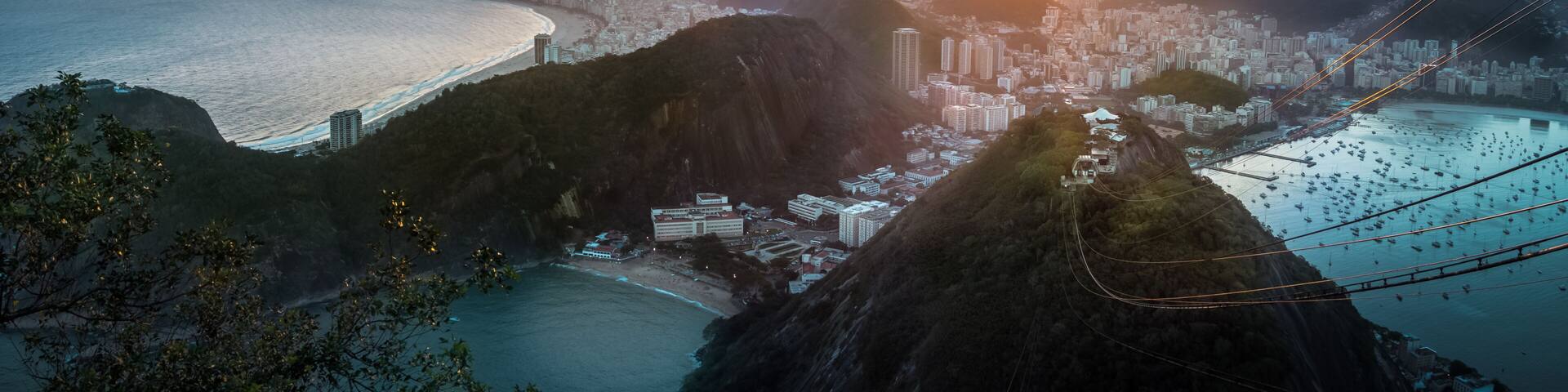 Aerial view of Rio de Janeiro Coast with Copacabana, Praia Vermelha beach, Urca and Corcovado mountain at sunset - Rio de Janeiro, Brazil