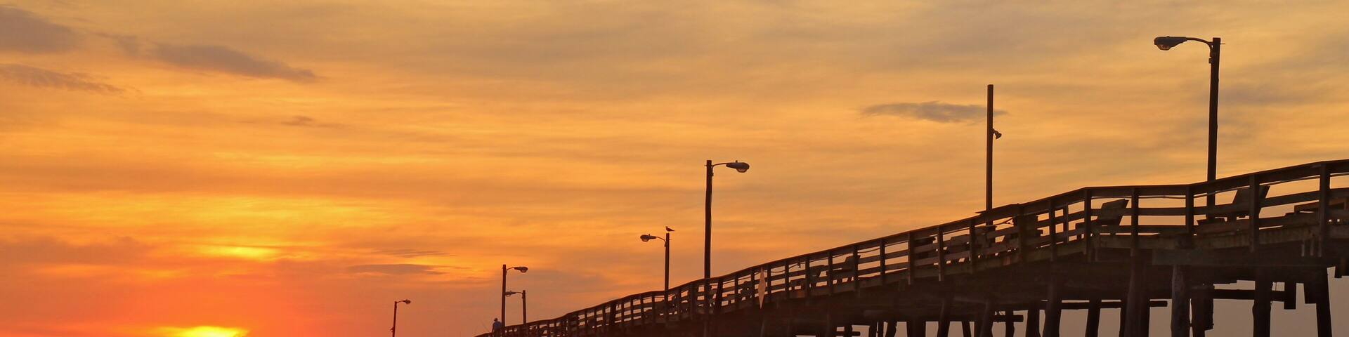 Sunrise by a fishing pier in North Carolina