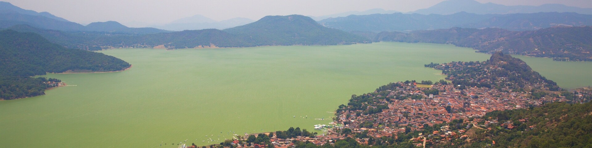 Toluca featuring landscape views, a coastal town and mist or fog