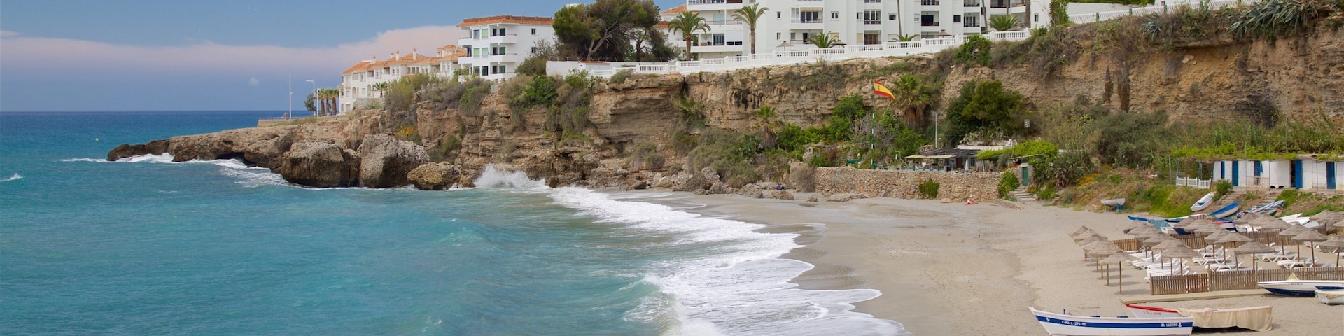 Salon Beach showing a coastal town, a bay or harbor and a sandy beach