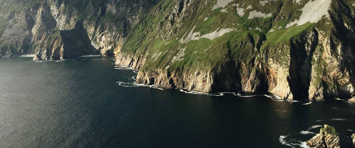 While the Cliffs of Moher are the most well known, Slieve League in Donegal are actually the highest cliffs in Europe, and are stunningly beautiful! Park at the very top for a quick view, or park farther down and walk up the lovely coastline.