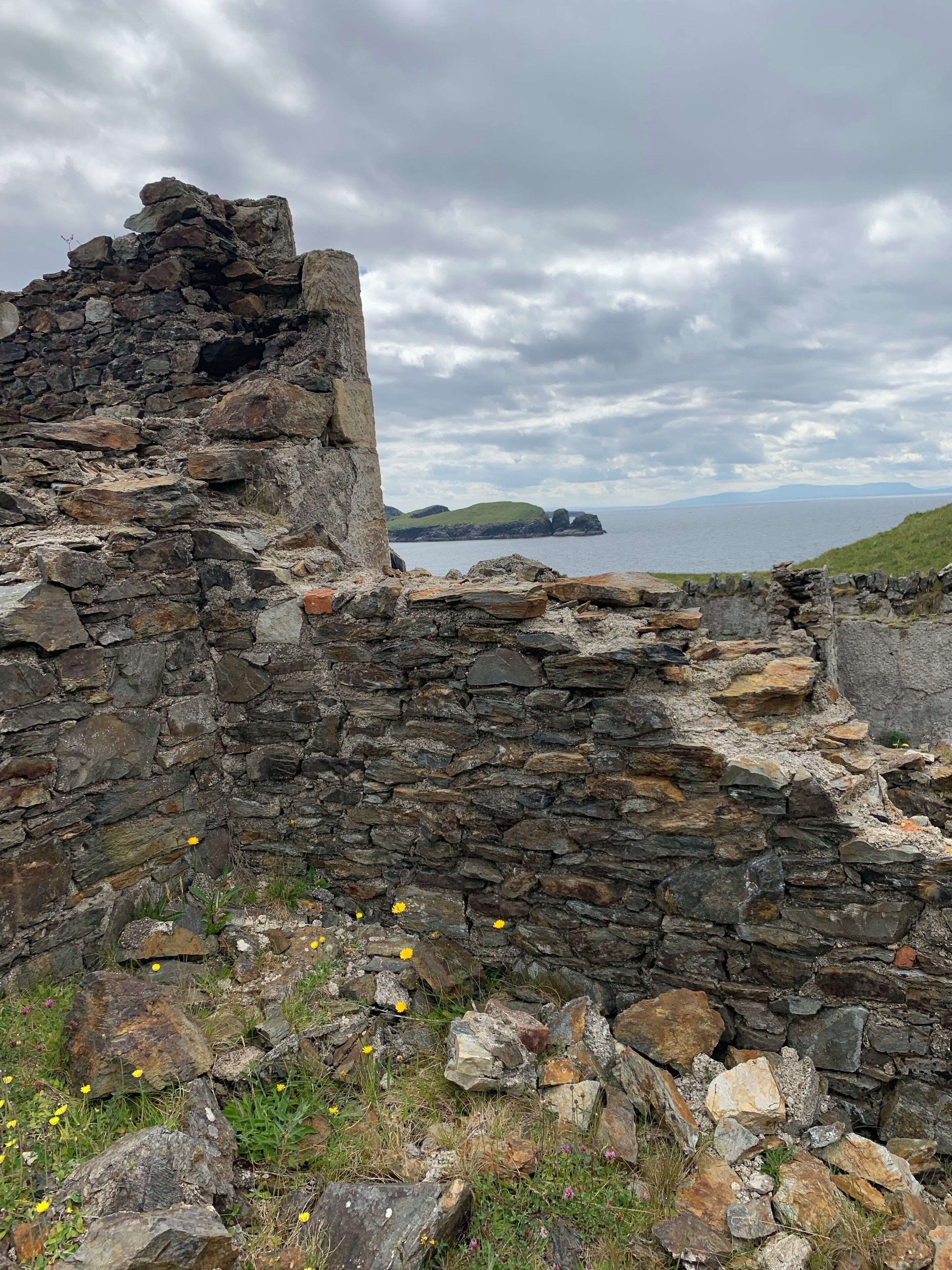 While waiting for the boating tour we climbed up to these ruins. Saw a man training his sheep and his sheep dog was chasing them all about the green hills