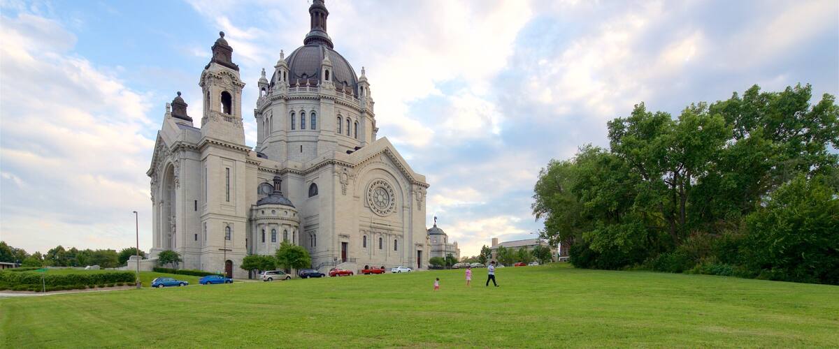 St. Paul which includes a church or cathedral, a sunset and a park