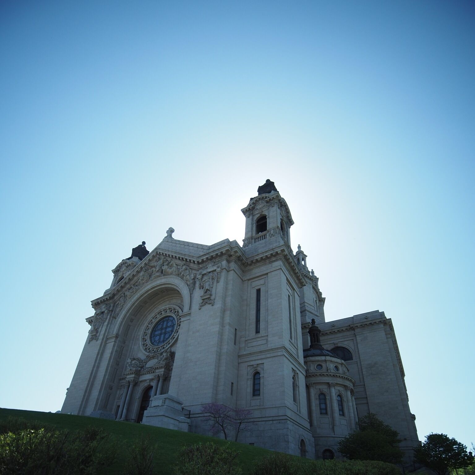 A large, historic church with a prominent bell tower and intricate architectural details.