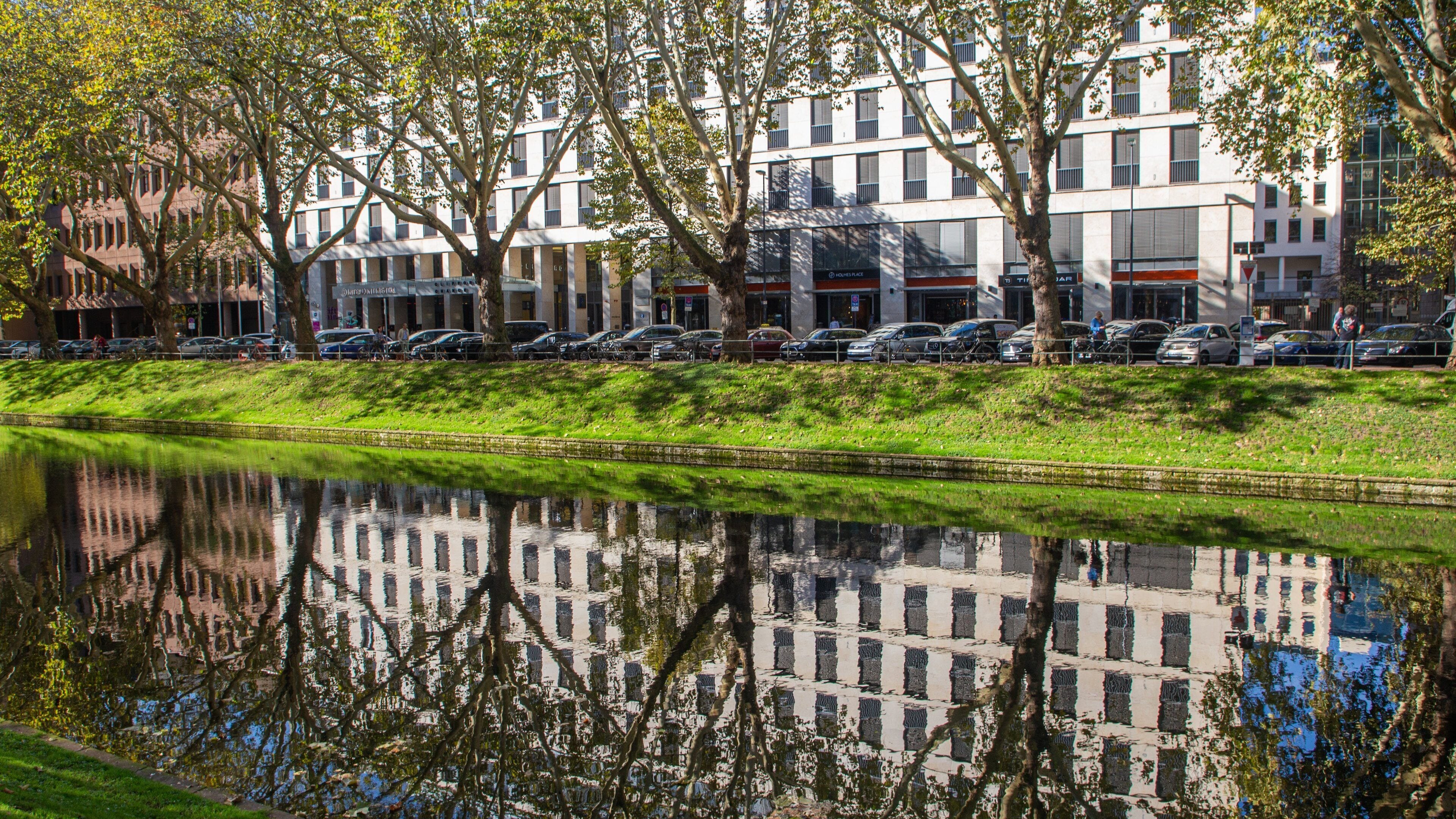 Konigsallee featuring a river or creek