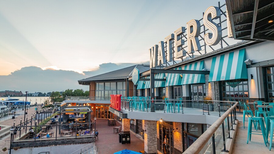 Waterside Festival Marketplace featuring signage and a sunset