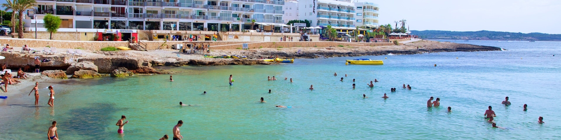 Calo des Moro Beach which includes general coastal views, a coastal town and swimming