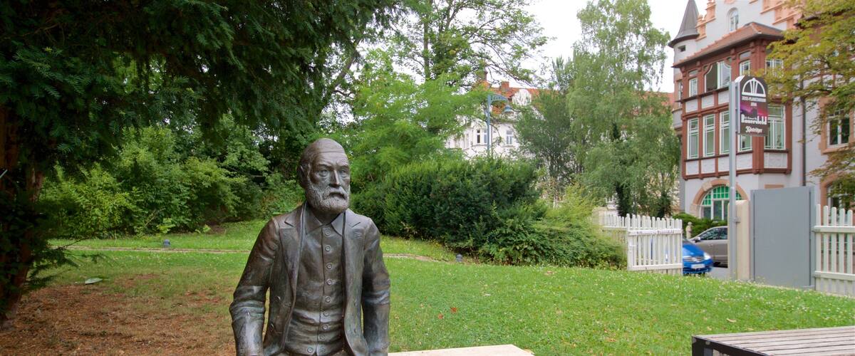 Zeiss Planetarium showing a statue or sculpture and a garden