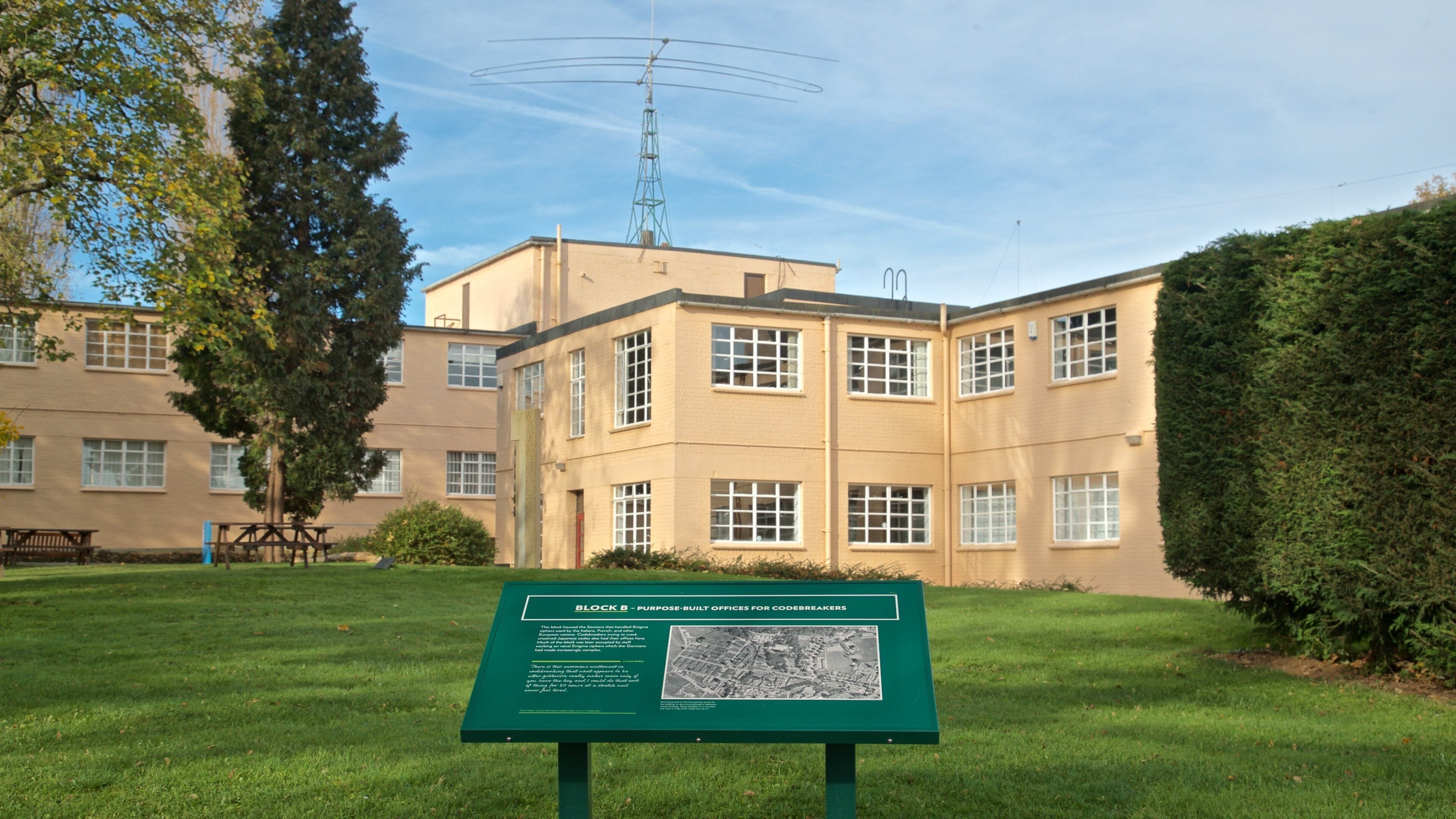 Bletchley Park featuring signage and a garden