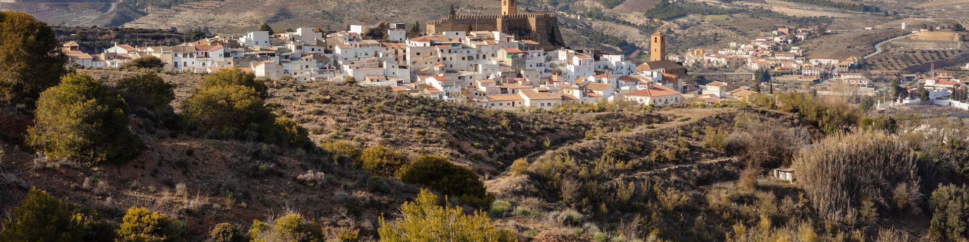 Panorama view on the ancient city of Seron in the rolling hills of the Los Filabres Mountain Range, Andalusia, Spain