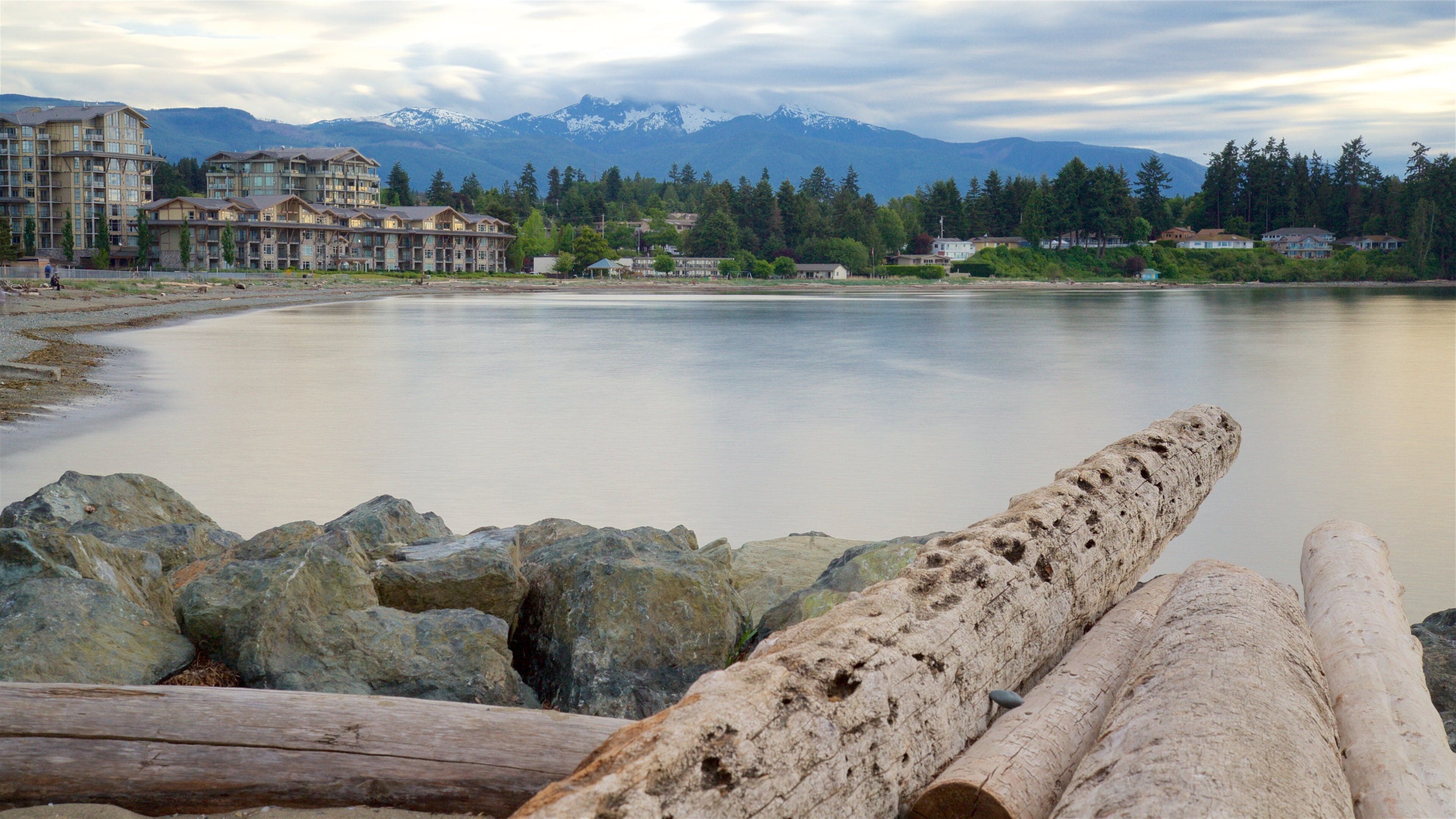 Parksville Beach which includes a lake or waterhole and a small town or village