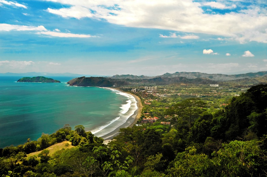 Aerial of Jaco Costa Rica, beach, The pacific coast.Rainforest sits in the forground