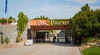 L\'Arenas which includes a garden and signage