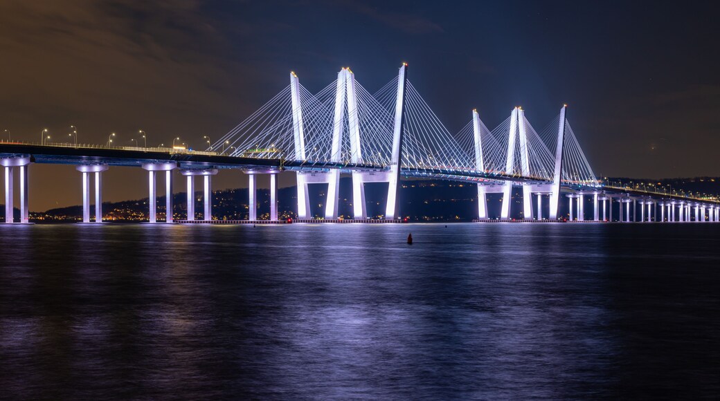 Night photo of the Governor Mario M. Cuomo Bridge, spanning the Hudson River between Tarrytown and Nyack