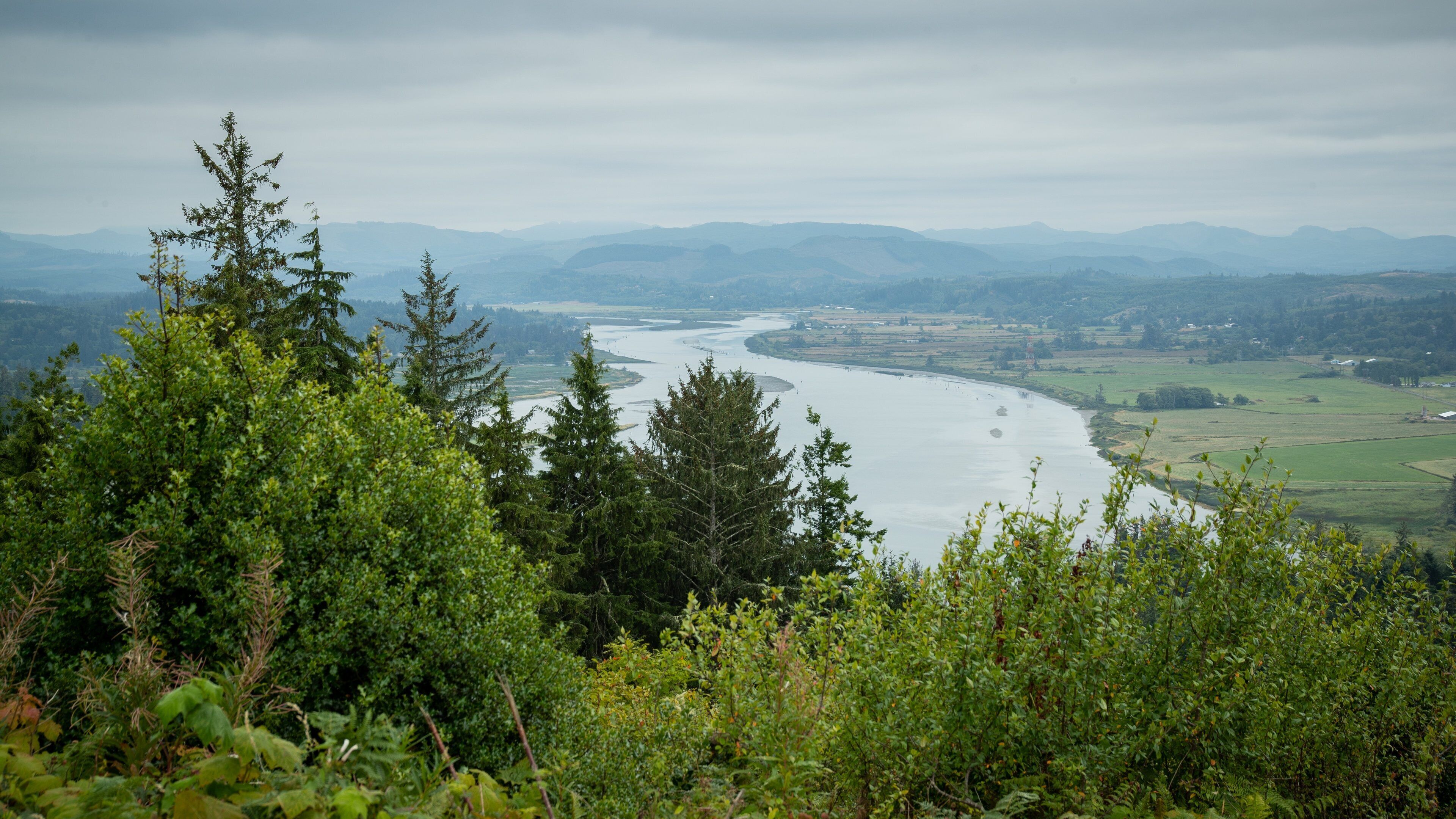 Astoria Column featuring landscape views and a river or creek