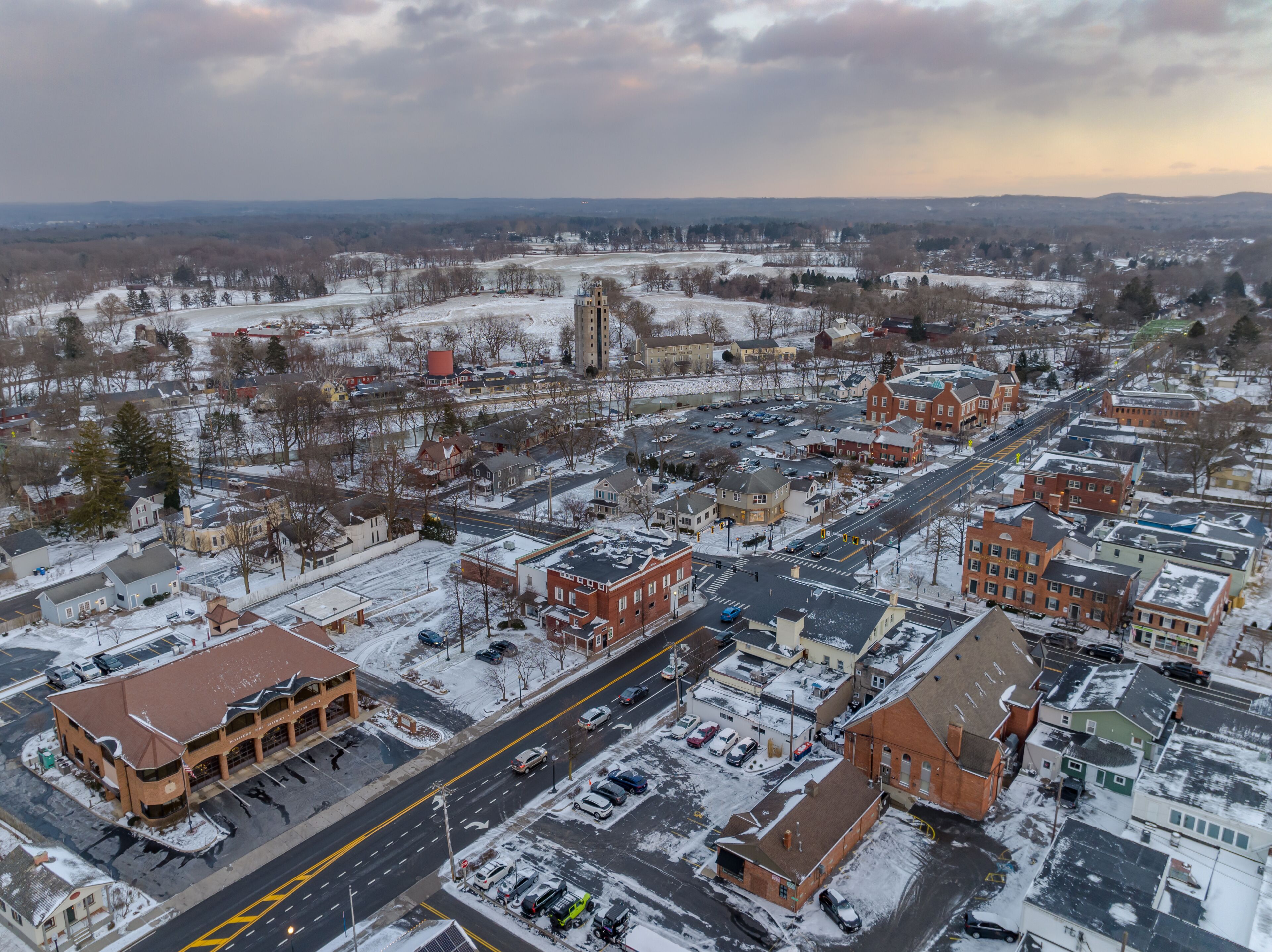 Early evening winter aerial photo of the four corners in the Village of Pittsford, New York. (01-14-2024)